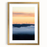 Elegant gold-framed landscape print depicting a serene countryside scene with lush greenery and rolling hills, perfect for adding sophistication to home decor.