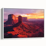 Framed canvas artwork depicting a serene desert landscape with warm earthy tones, showcasing a white frame and side view for elegant home decor enhancement.