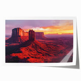 Desert landscape rolled canvas print showcasing vibrant hues of orange and gold, evoking a serene sunset. Packaged securely in a protective cardboard tube.