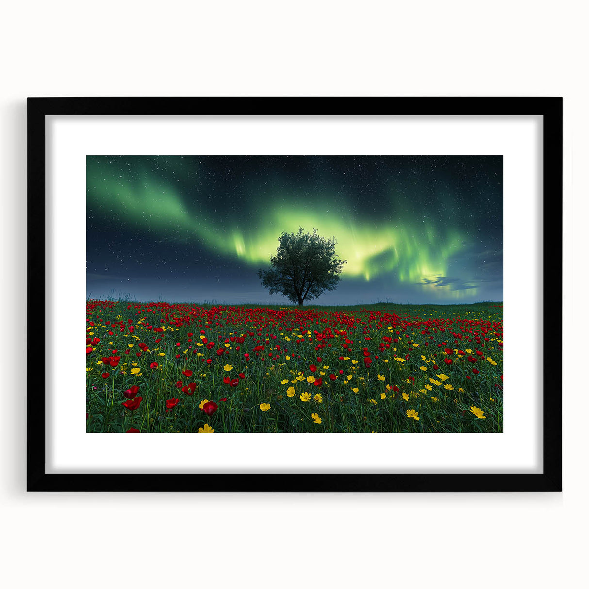Black-framed landscape artwork showcasing vibrant green fields under a blue sky, elegantly matted for a polished display, ideal for home decor.