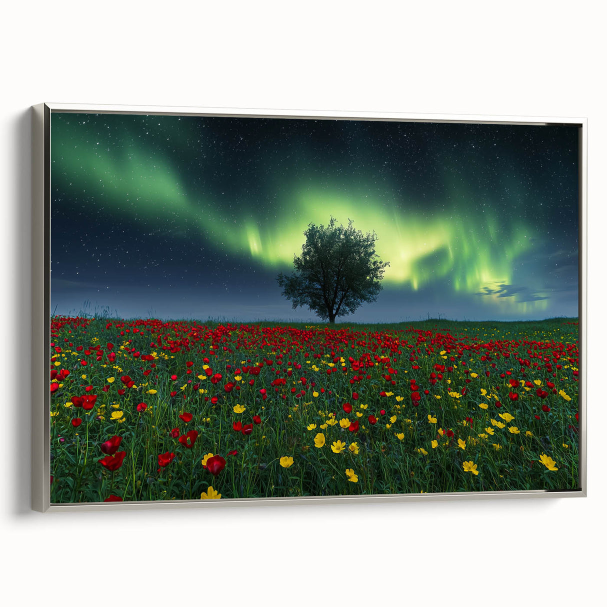 Framed canvas artwork depicting a serene landscape with vibrant green fields and a clear blue sky, featuring a silver frame that enhances its elegance. Ideal for home decor, this piece brings nature indoors, adding a tranquil atmosphere to any room.