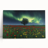 Stretched canvas showcasing a vibrant landscape scene with lush green fields under a clear blue sky, leaning against a rustic wooden wall, perfect for home decor.