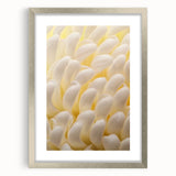 Textured abstract art print of florals in soft pastel shades, framed in silver, ideal for bedroom wall decor.