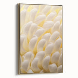 Framed canvas depicting a close-up of floral elements in muted gold and black, ideal for bedroom wall art.