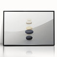 Large abstract wall art featuring natural elements in muted earth tones, framed in black acrylic.