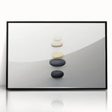Large abstract wall art featuring natural elements in muted earth tones, framed in black acrylic.