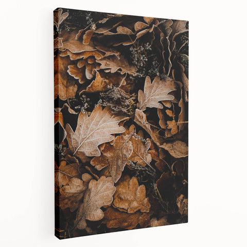 Large art depicting an abstract fall landscape in warm orange and red tones on stretched canvas.