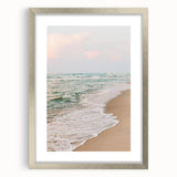 Textured abstract art print with vibrant orange and yellow hues, framed in silver, ideal for bedroom decor.