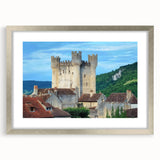 Elegant silver-framed landscape artwork featuring a picturesque castle scene, beautifully matted for display. Ideal for enhancing home decor with a touch of sophistication.
