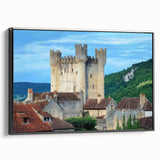 Framed canvas artwork showcasing a picturesque landscape with a majestic castle, set against a serene backdrop, featuring sleek black framing and vibrant colors. Ideal for enhancing home decor with a classic touch.