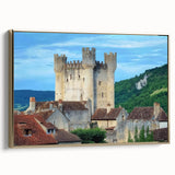Framed canvas artwork depicting a scenic landscape with a majestic castle, elegantly bordered in gold, showcasing intricate details and vibrant colors, adding a touch of sophistication to home decor.