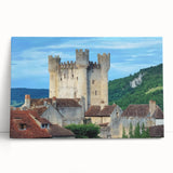 Stretched canvas artwork depicting a picturesque landscape with a majestic castle, surrounded by lush greenery and a vibrant blue sky, perfect for home decor.