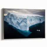 Framed canvas artwork depicting dramatic cliffs in a serene landscape, featuring silver accents that enhance its elegance, perfect for modern home decor.