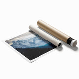 Stunning rolled print of coastal cliffs at sunset, showcasing vibrant oranges and deep blues, ideal for home decor or art collection, packaged securely.