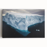 Stretched canvas artwork depicting a dramatic landscape of cliffs against a vibrant sunset, showcasing rich colors and textures, ideal for home decor enhancement.