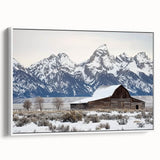 Landscape barn-framed canvas artwork showcasing a serene nature scene with soft hues of green and blue, perfect for rustic home decor. The piece is viewed from the side to highlight the elegant framing and texture.