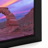 Framed canvas print showcasing a stunning landscape of colorful canyons, highlighting intricate textures and vibrant hues, perfect for enhancing home decor.