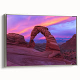 Framed canvas artwork showcasing a stunning landscape of canyons, featuring intricate details and a sleek silver frame, perfect for enhancing home decor.