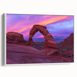 Framed landscape canvas print showcasing dramatic canyons in warm earthy tones, with a sleek white frame, perfect for enhancing modern home decor.