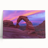Stretched canvas artwork depicting a vibrant canyon landscape with rich hues of orange and red, perfect for enhancing home decor and creating a warm atmosphere.