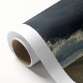 Vibrant rolled canvas showcasing a serene countryside landscape with lush green fields and a bright blue sky, elegantly packaged in a protective cardboard tube.