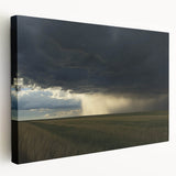 Stretched canvas artwork depicting a serene countryside landscape with vibrant greens and soft blues, showcasing rolling hills and a tranquil sky, perfect for home decor.