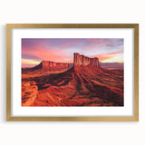 Desert landscape framed in an elegant gold frame with a mat, showcasing vibrant colors and intricate details, perfect for enhancing home decor and art collections.