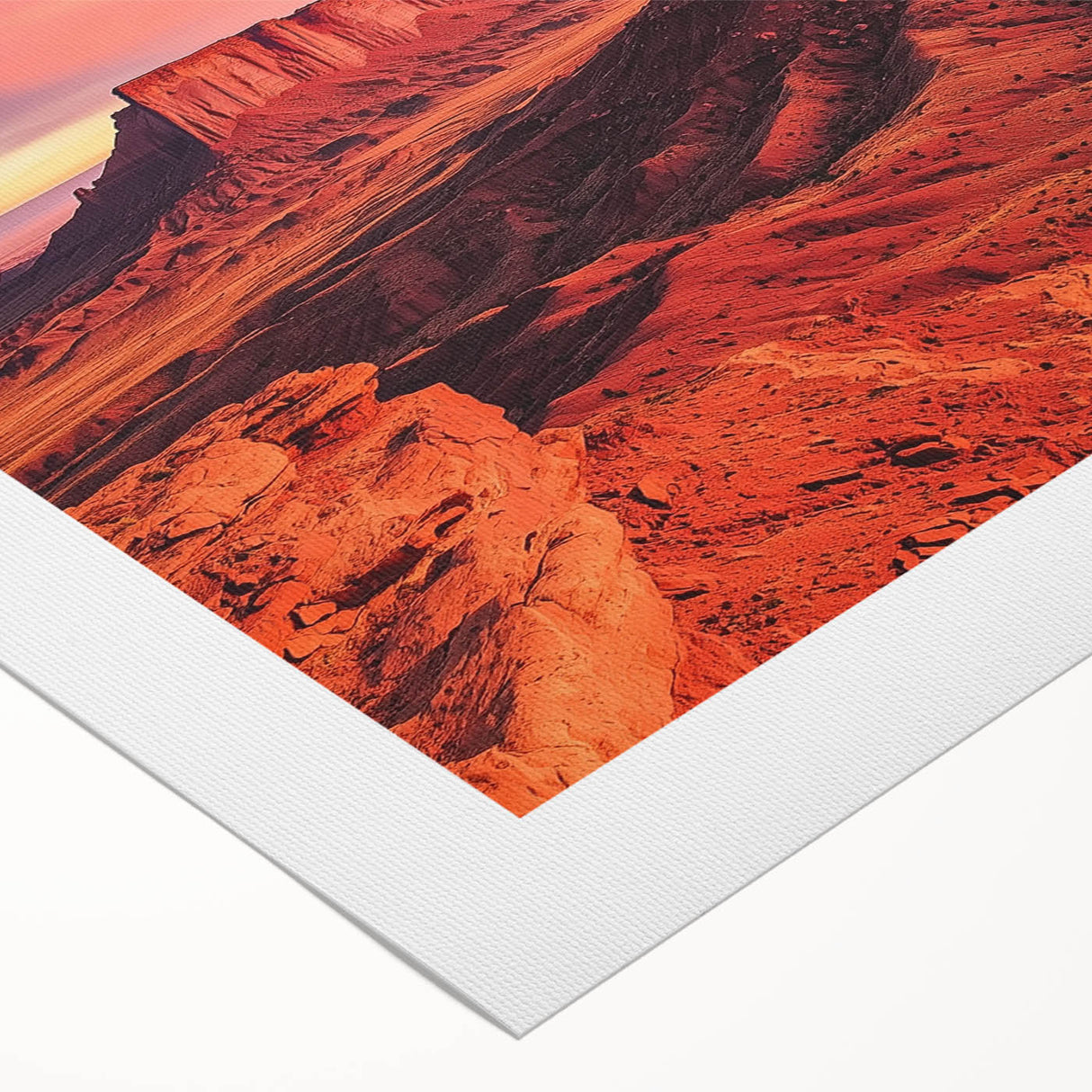 Desert landscape rolled canvas art showcasing vibrant hues of orange and yellow with textured details, securely packaged in a protective cardboard tube for shipping. Perfect for adding warmth and character to any living space.