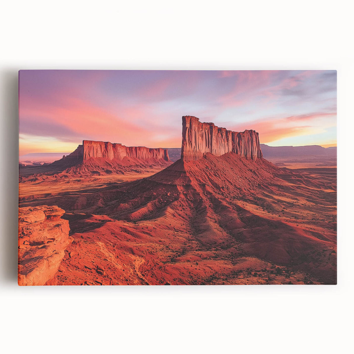 Stretched canvas artwork displaying a vibrant desert landscape with warm hues of orange and yellow, ideal for home decor or artistic inspiration.