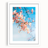 Abstract art print featuring swirling pastel shades on a white-framed canvas, ideal for bedroom or dining room decor.