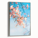 Framed canvas featuring a vintage landscape art painting of spring with colorful trees and a black border.