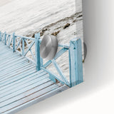 Large abstract wall art in vibrant orange and blue tones on acrylic glass.