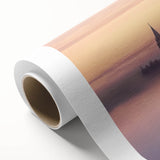 Rolled canvas artwork showcasing a stunning landscape featuring a majestic castle surrounded by lush greenery and vibrant skies, elegantly packaged for safe delivery.