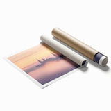 Rolled print showcasing a vibrant landscape featuring a majestic castle surrounded by lush greenery and a clear blue sky, perfect for home decor. The print is carefully rolled for easy shipping and display.