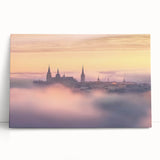 Stretched canvas artwork showcasing a beautiful landscape with a majestic castle surrounded by lush greenery and vibrant skies, perfect for home decor.