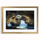 Elegant gold-framed landscape artwork featuring a cave scene, with a textured mat and intricate detailing, perfect for enhancing home decor and artistic ambiance.