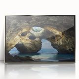 Framed acrylic artwork showcasing a stunning landscape with intricate cave details, featuring a silver finish that enhances the visual appeal and adds elegance to any room decor.