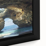 Close-up of a framed canvas artwork showcasing a vivid landscape with intricate cave details, ideal for enhancing home decor with natural beauty and artistic flair.