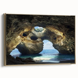 Framed canvas artwork showcasing a serene landscape with cave formations, highlighted by a gold frame, perfect for enhancing modern home decor.