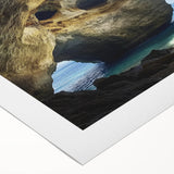 Stunning rolled canvas art depicting a vibrant landscape with intricate caves and natural formations, beautifully packaged for easy display and protection.