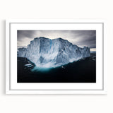 Framed landscape artwork showcasing dramatic cliffs in vibrant colors, set within a white mat and sleek frame, perfect for enhancing modern home decor.