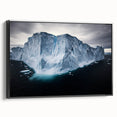 Framed canvas artwork showcasing a dramatic cliff landscape with vibrant colors, designed to enhance modern decor; features a sleek black frame for a stylish side view.