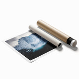 Stunning landscape print showcasing majestic cliffs and a vibrant sky, rolled for easy transport and framed in a protective cardboard tube, perfect for home décor.