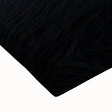 Close-up of a stretched canvas artwork depicting a dramatic cliff landscape, showcasing rich colors and intricate details, perfect for home decor enhancement.