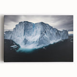 Stretched canvas artwork depicting a scenic landscape of rugged cliffs under a vibrant sunset, showcasing rich colors and dramatic lighting, perfect for home decor.