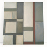 Abstract geometric canvas art featuring vibrant colors and intricate shapes, leaning against a wall, ideal for modern home decor and artistic interiors.