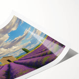 Landscape barn print on rolled canvas, showcasing a rustic scene with vibrant green fields and a blue sky, elegantly packaged in a protective cardboard tube for safe shipping.