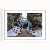 Landscape art print titled "Canyons" displayed in a white mat frame, showcasing vibrant colors and intricate details of canyon formations, perfect for home decor.