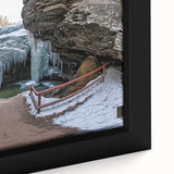 Framed canvas artwork showcasing a vibrant landscape of canyons with rich colors and intricate details, perfect for enhancing home decor in living spaces.