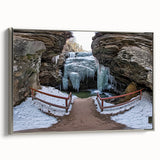 Framed landscape canvas depicting vibrant canyons in rich earthy tones, featuring a sleek silver frame that enhances the artwork's depth and elegance. Ideal for modern home decor.